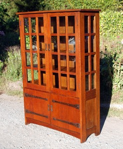 Large L. & J. G. Stickley 4 door China Cabinet with strap hinges on lower doors